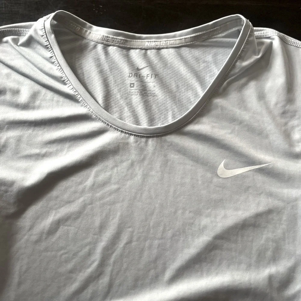 Nike women's long sleeve Dri-fit, Size M